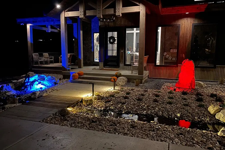 landscape design in a front yard at night