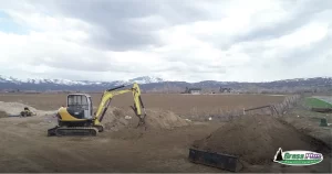 Land reclamation and restoration using an excavator